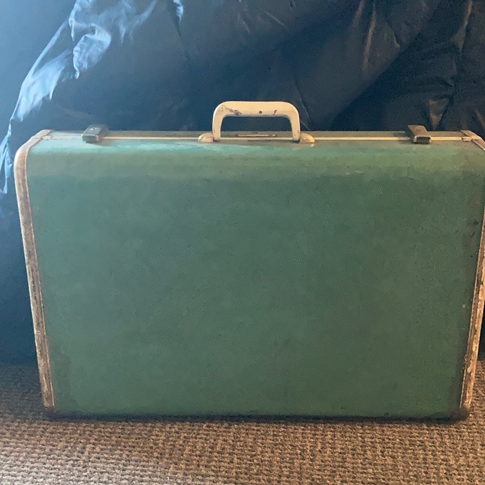 Vintage teal suitcase